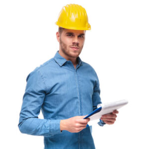 portrait of handsome engineer with clipboard in hand and safety helmet on head, standing on white background